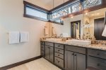 Master private bathroom with double vanity and walk-in shower